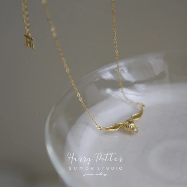 Collar Hogwarts Snitch dorada brillante Harry Potter