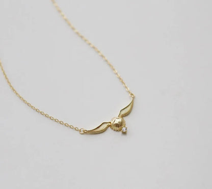 Collar Hogwarts Snitch dorada brillante Harry Potter