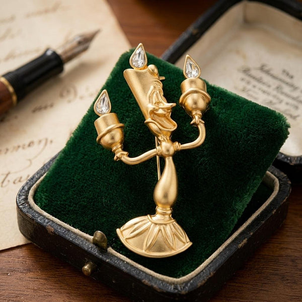 Broche Pin dorado Lumière de La Bella y la Bestia